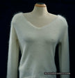 Woman's white angora V-neck sweater with split cuffs by H&M