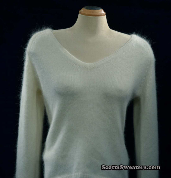 Woman's white angora V-neck sweater with split cuffs by H&M