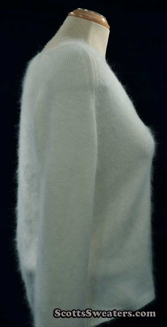 Woman's white angora V-neck sweater with split cuffs by H&M medium size