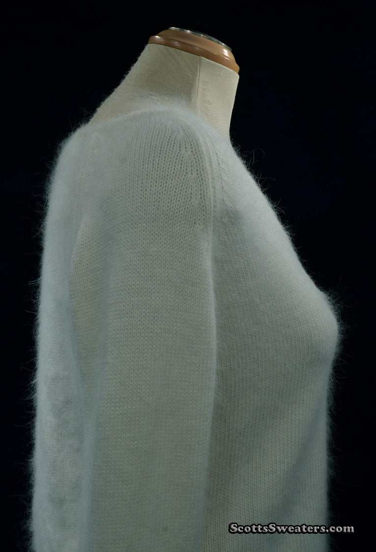 Woman's white angora V-neck sweater with split cuffs by H&M medium size