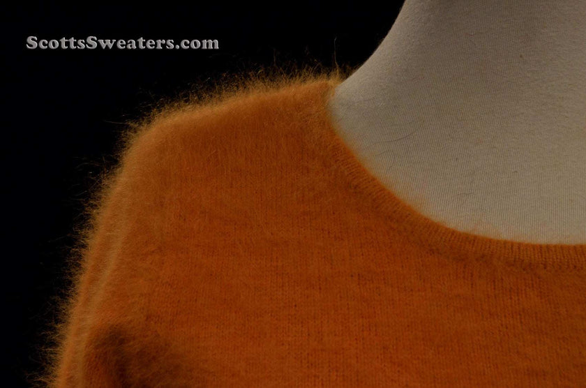 Woman wearing golden roundneck angora sweater by Scott's Sweaters