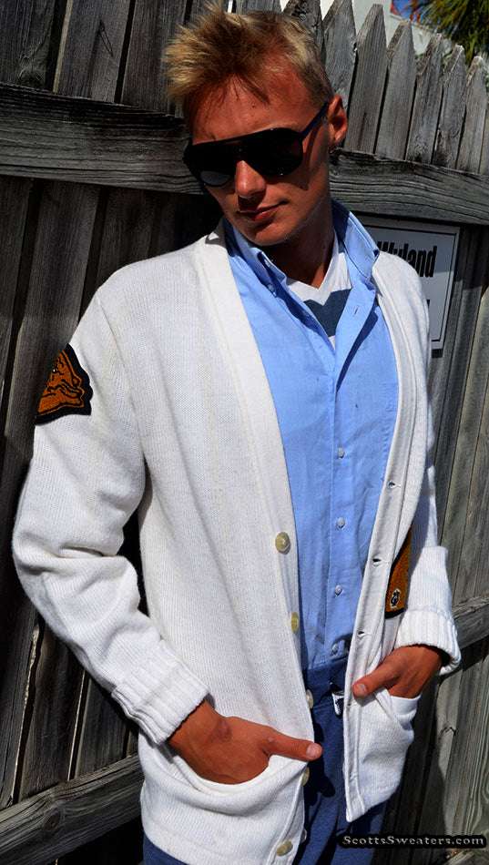 Man wearing retro classic cardigan letterman sports sweater in white with patches