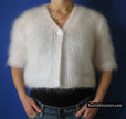 Woman's hand-knitted mohair shrug with half and three-quarters sleeves