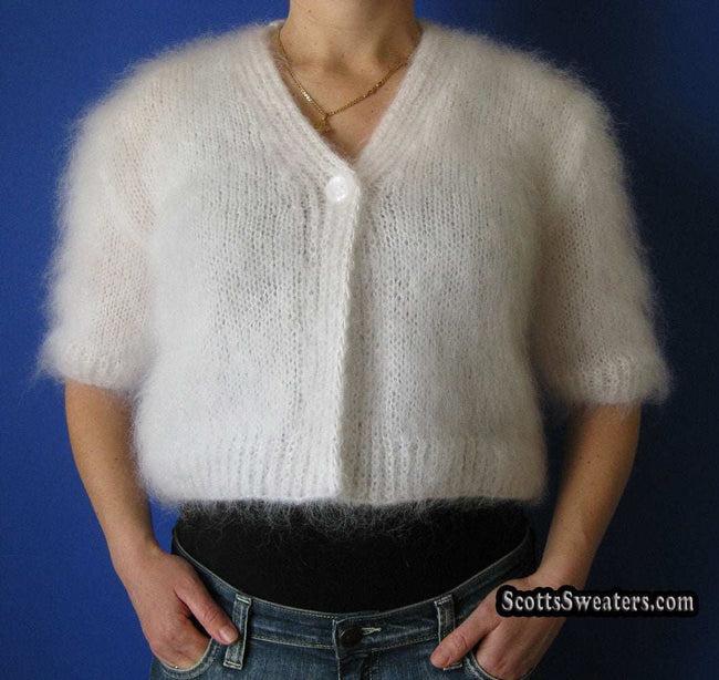Woman's hand-knitted mohair shrug with half and three-quarters sleeves