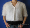 Woman's hand-knitted mohair shrug with half and three-quarters sleeves