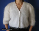 Woman's hand-knitted mohair shrug with half- or three-quarter sleeves available in various colors and sizes