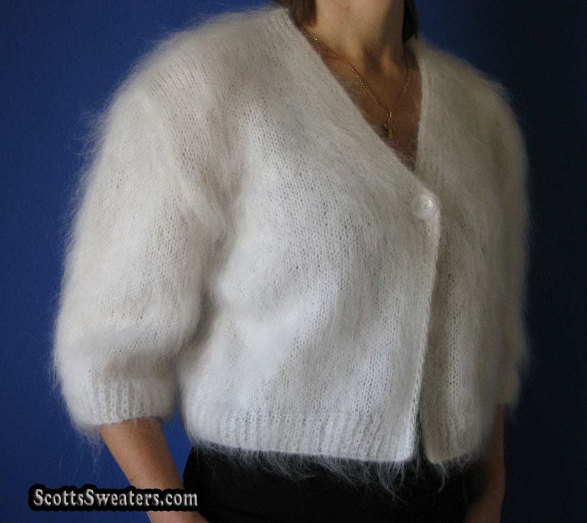 Woman's hand-knitted mohair shrug with half and three-quarters sleeves options
