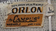 Men's retro zipper-front white cardigan with black geodesic design by Campus, size small-medium