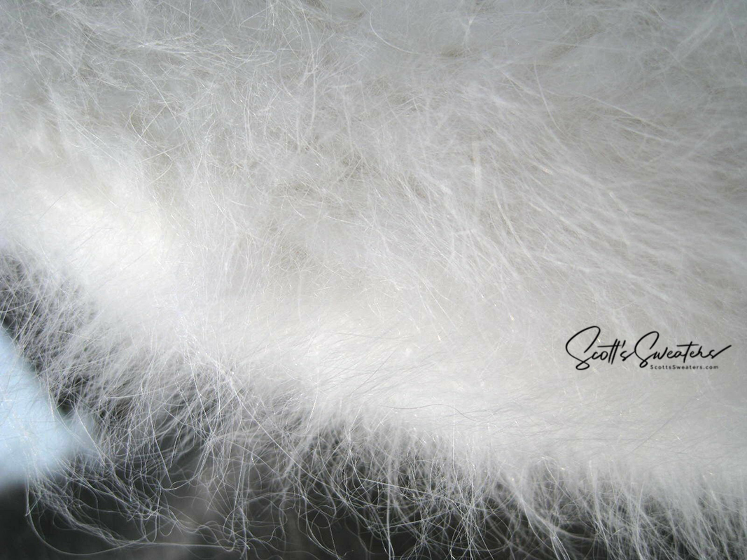 Siberian woman's white hand-knit angora Ushanka hat with ear flaps