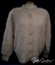 Woman wearing beige angora cardigan sweater by Connie A. Lee Nylon lined small-medium