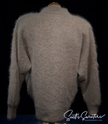 Woman wearing beige angora cardigan sweater by Connie A. Lee, small-medium size