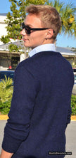 Men's navy blue cardigan mohair sweater with horizontal stripes by GANT Rugger, model wearing sunglasses outdoors