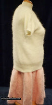 Woman's short angora skirt with elastic waistband in soft pink color