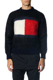 Men's black Tommy Hilfiger mohair crewneck sweater with large red and white flag logo on chest