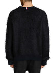 Back view of men's black crewneck Tommy Hilfiger mohair sweater with ribbed cuffs and hem