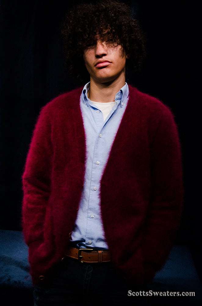 Men's ultra-soft angora cardigan sweater in deep red worn over light blue shirt