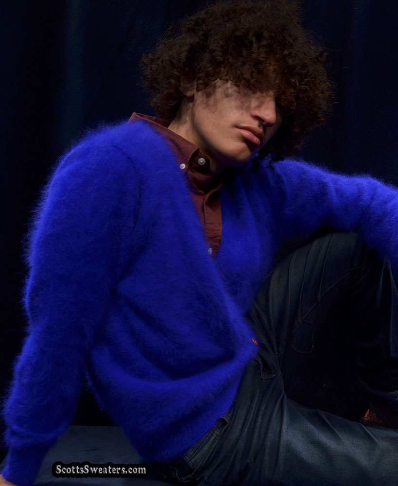 Men's ultra-soft blue angora cardigan sweater with plush texture and relaxed fit