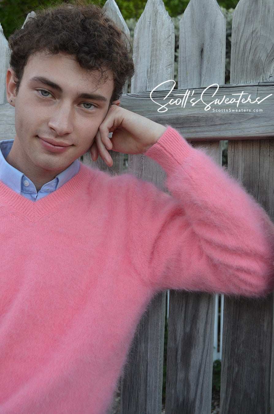 Men's ultra-soft angora V-neck sweater in pink modeled outdoors