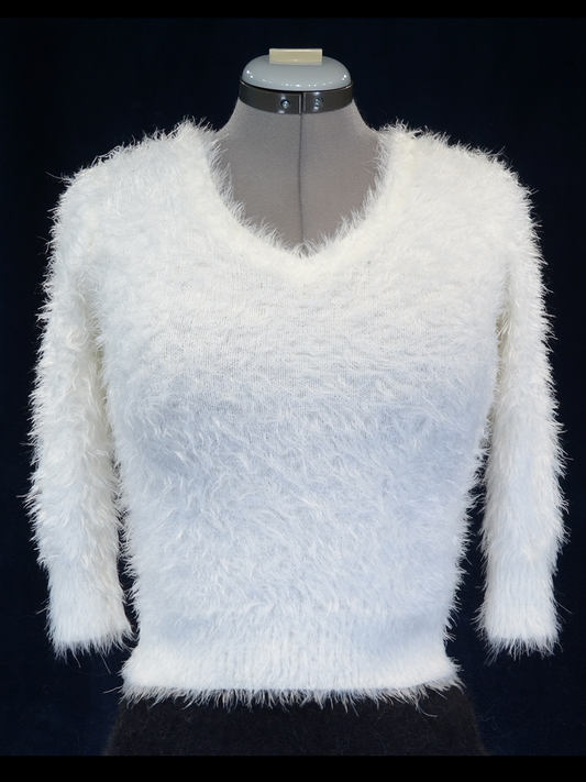 Woman's fuzzy white plush eyelash crop-top V-neck sweater with 3/4 sleeves on mannequin