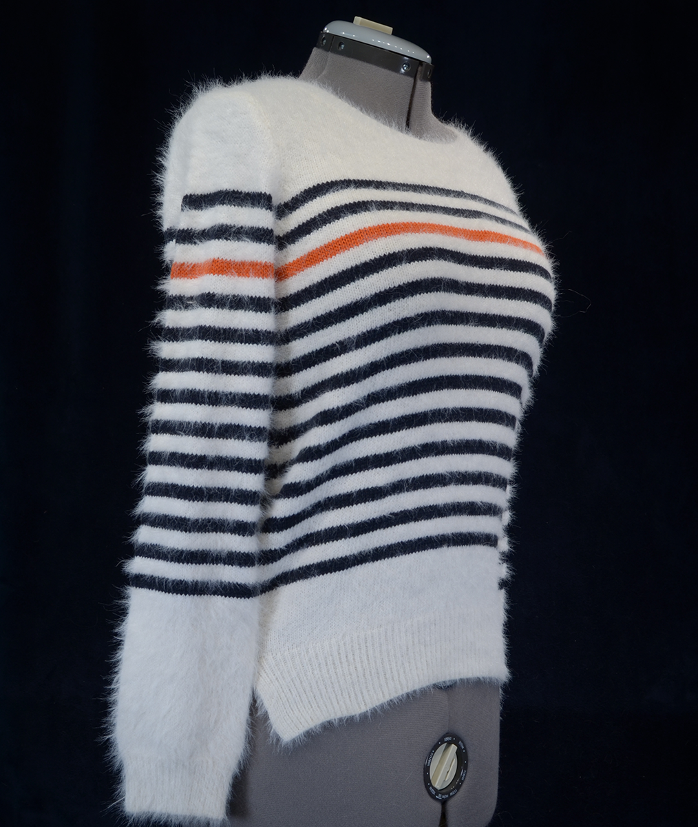Woman's fuzzy white plush crewneck sweater with black and orange horizontal stripes by Anthropologie Moth