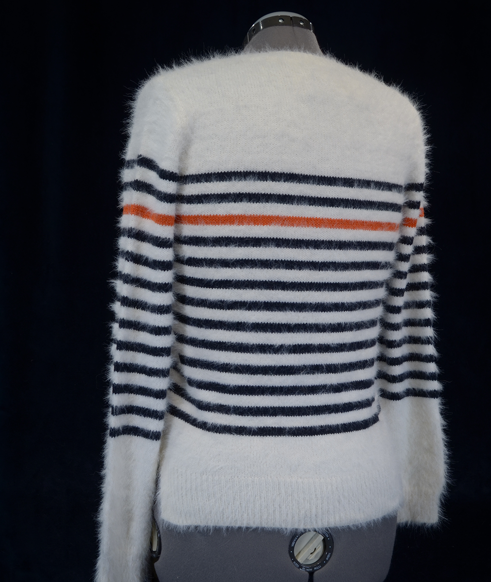 Woman's fuzzy white plush crewneck sweater with black and orange horizontal stripes by Anthropologie Moth