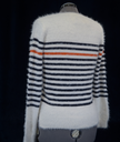 Woman's fuzzy white plush crewneck sweater with black and orange horizontal stripes by Anthropologie Moth