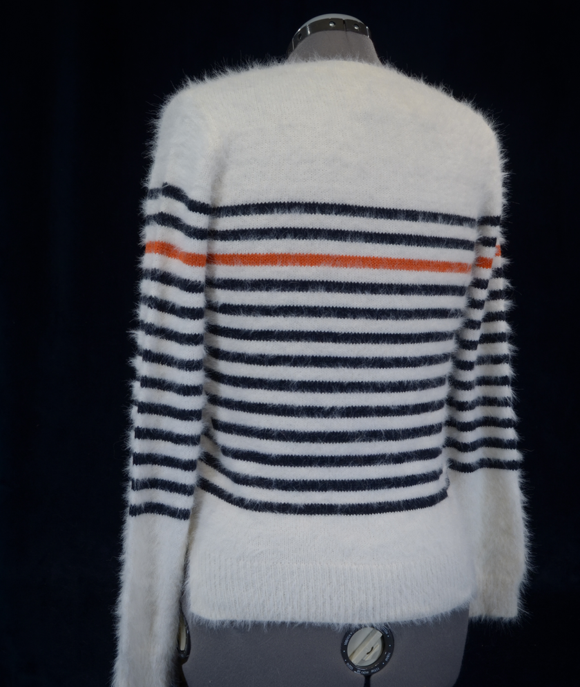 Woman's fuzzy white plush crewneck sweater with black and orange horizontal stripes by Anthropologie Moth