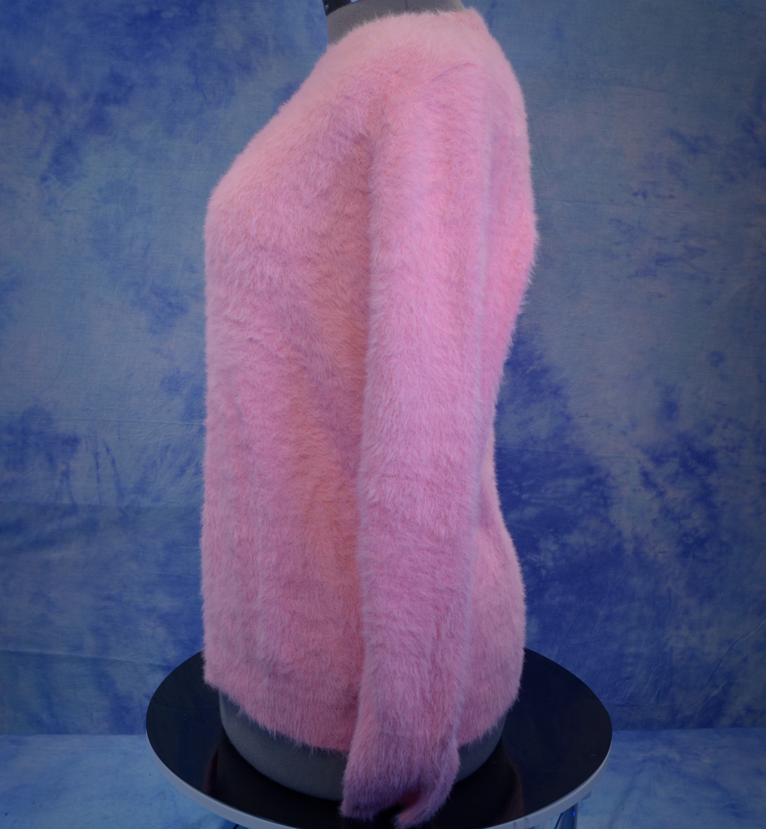 Girls's fuzzy pink plush crewneck sweater by Old Navy on mannequin side view