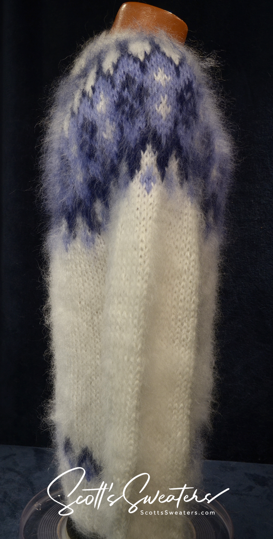 White men's hand-knit turtleneck mohair sweater with blue yoke pattern, small-medium size