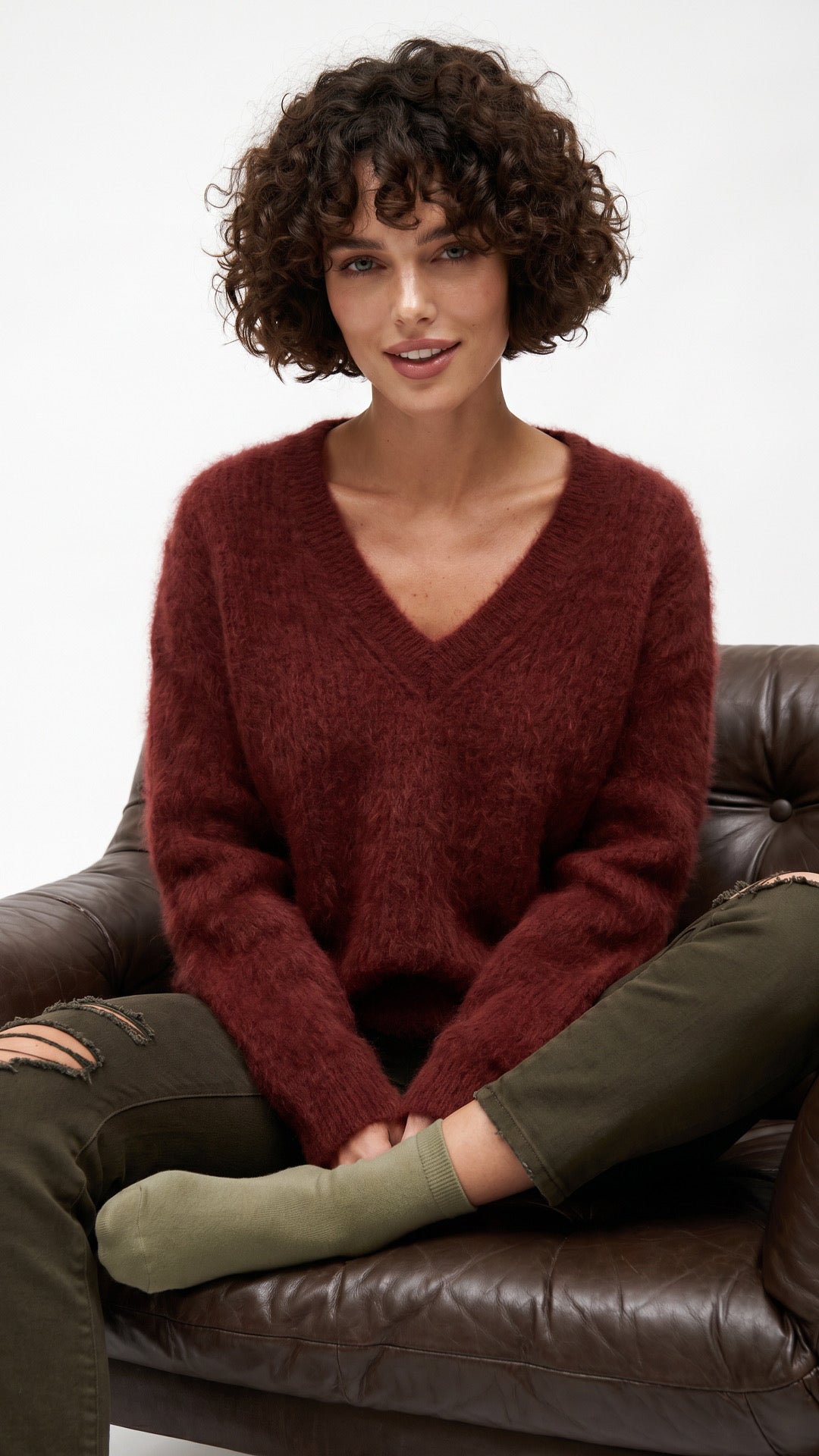 Men's soft luxurious angora sweater with rib-knit texture and V-neck design for versatile style and comfort