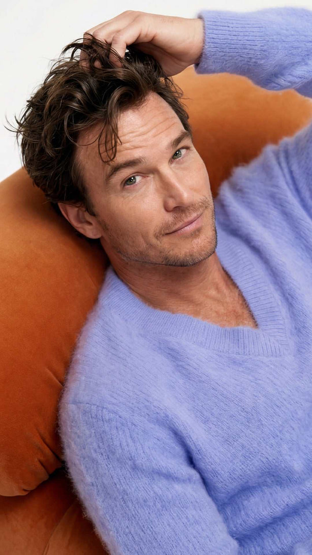 Men's soft luxurious angora sweater with rib-knit texture and V-neck design in premium knitwear collection