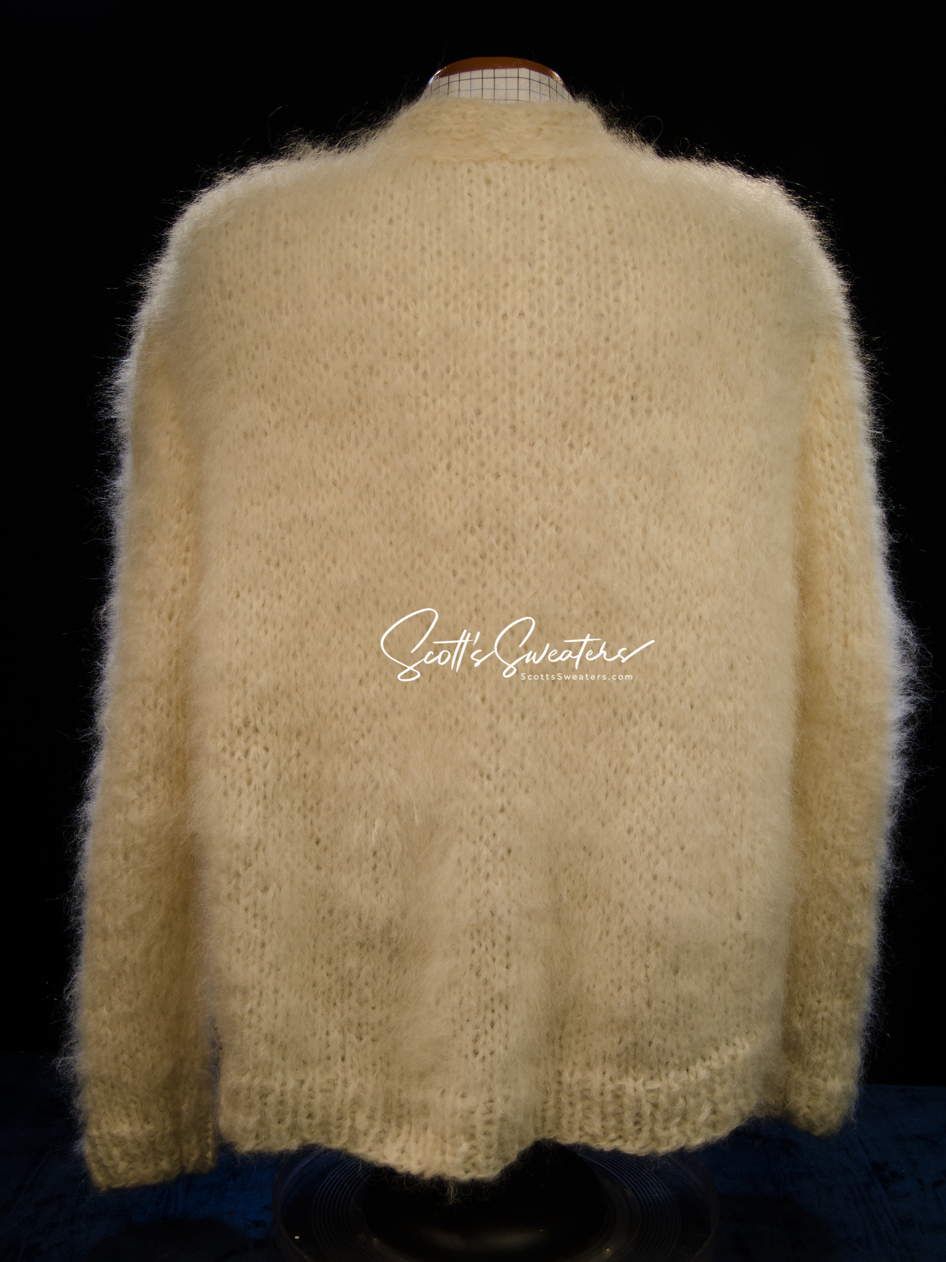 Men's hand-knit mohair and alpaca blend cardigan sweater with soft texture and cable-knit details