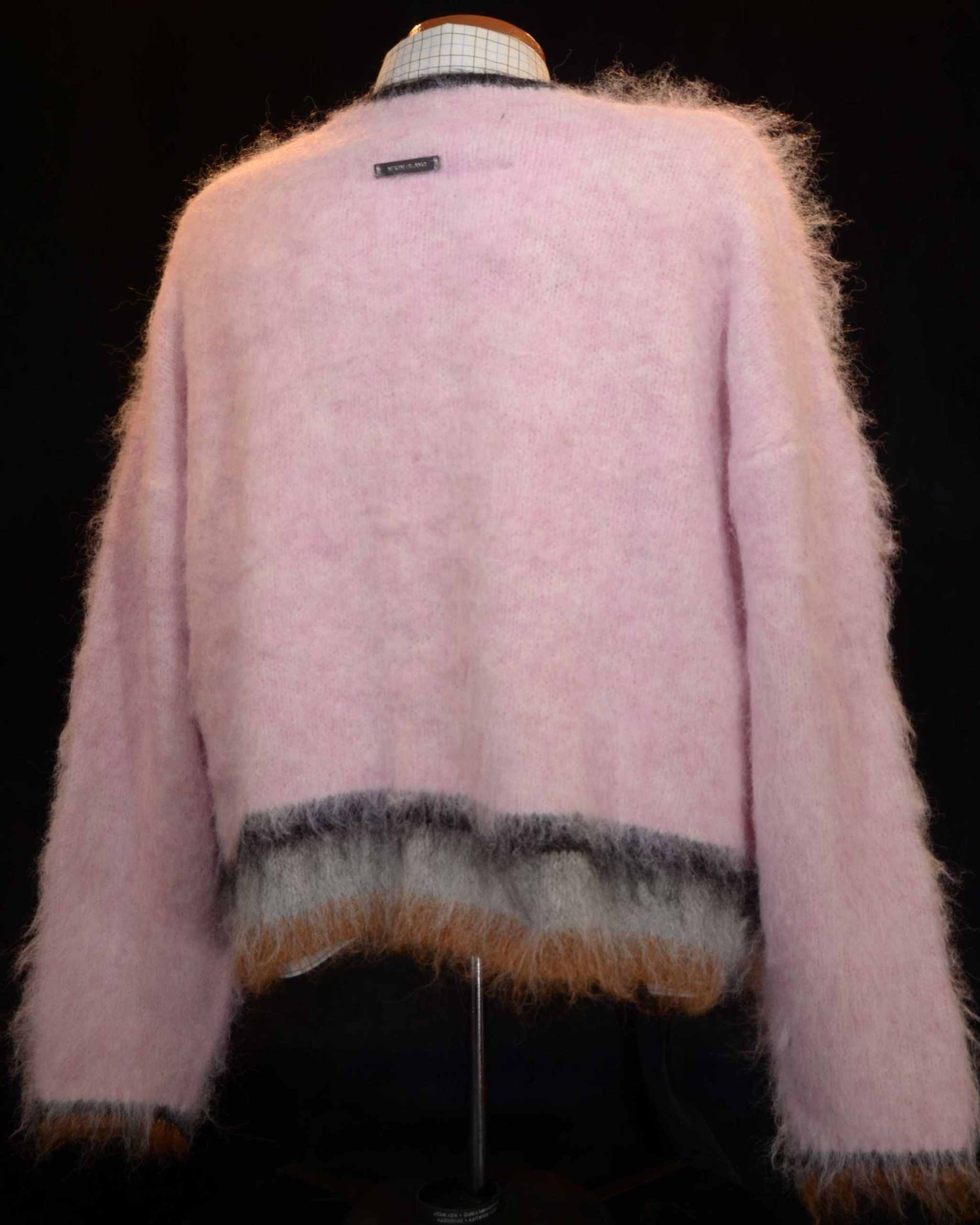 Men's fuzzy sweater modern design close-up on fabric texture