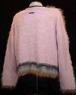 Men's fuzzy sweater modern design close-up on fabric texture