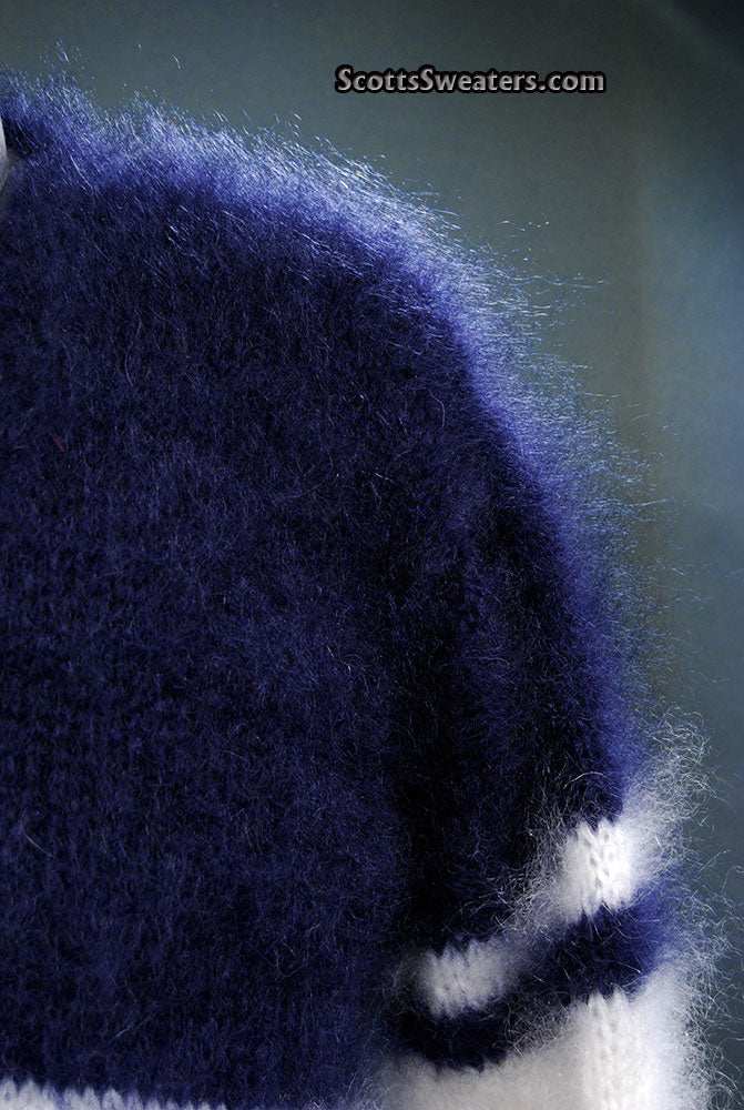 Close-up of extra soft men's kid mohair sweater in dark blue with white stripes showing fine brushed texture