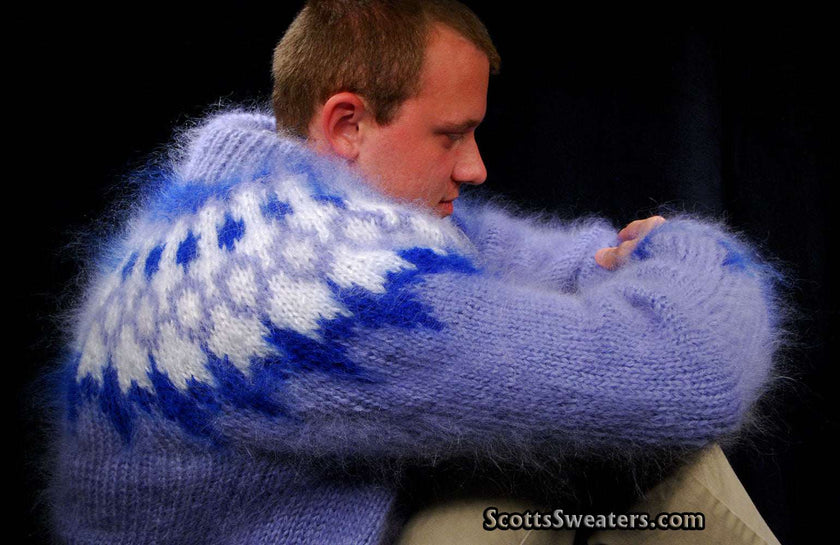 Man wearing hand-knit fuzzy mohair cardigan men's sweater with blue and white pattern
