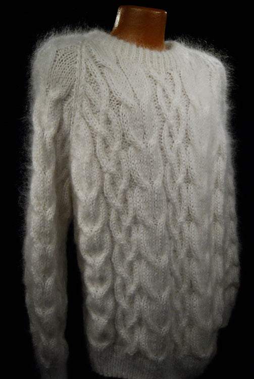 Men's handknit thick cabled mohair sweaters in white, black, camel, and beige with crewneck and turtleneck styles
