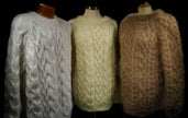 Men's handknit thick cabled mohair sweaters in crewneck and turtleneck styles, available in white, black, camel, and beige colors