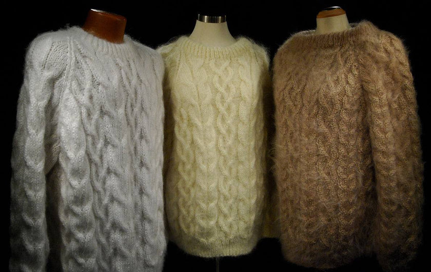 Men's handknit thick cabled mohair sweaters in crewneck and turtleneck styles, available in white, black, camel, and beige colors