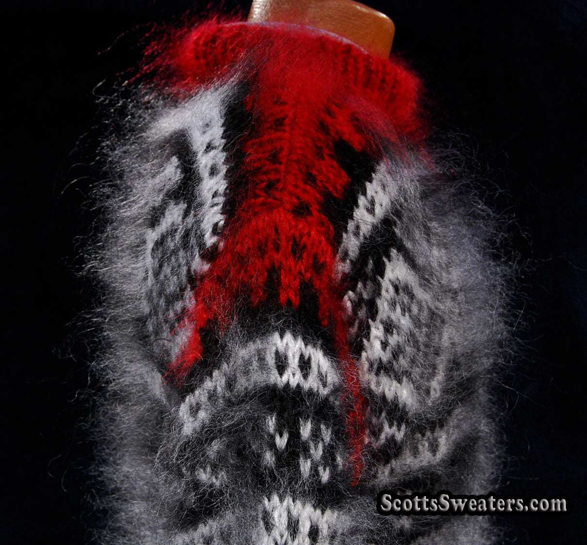 Men's black mohair pullover sweater with red and white yoke design on crewneck