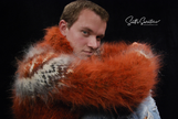 Copper colored men's hand-knit mohair turtleneck sweater