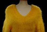 Woman's fuzzy yellow mohair sweater with double V-neck, hand-knit, one-size fit medium to X-large