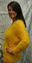 Woman wearing a bright fuzzy yellow mohair double V-neck sweater by Scott's Sweaters