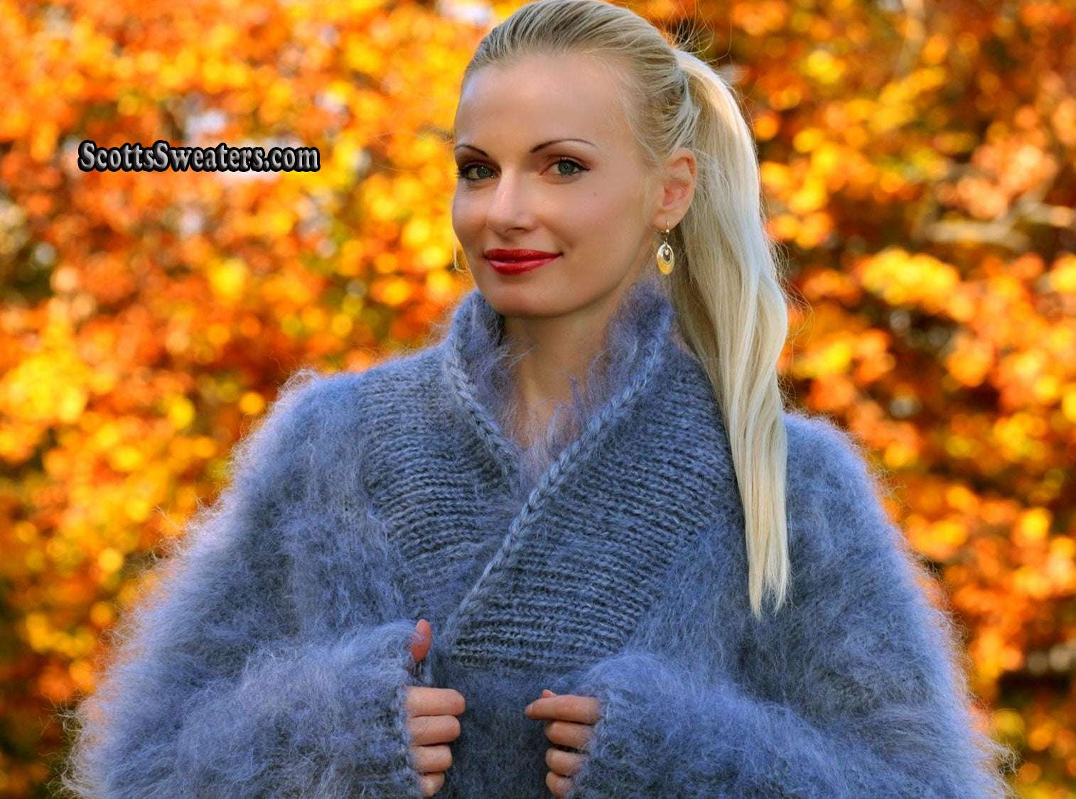 Woman wearing hand-knit unisex mohair sweater with cross-over neck in autumn setting