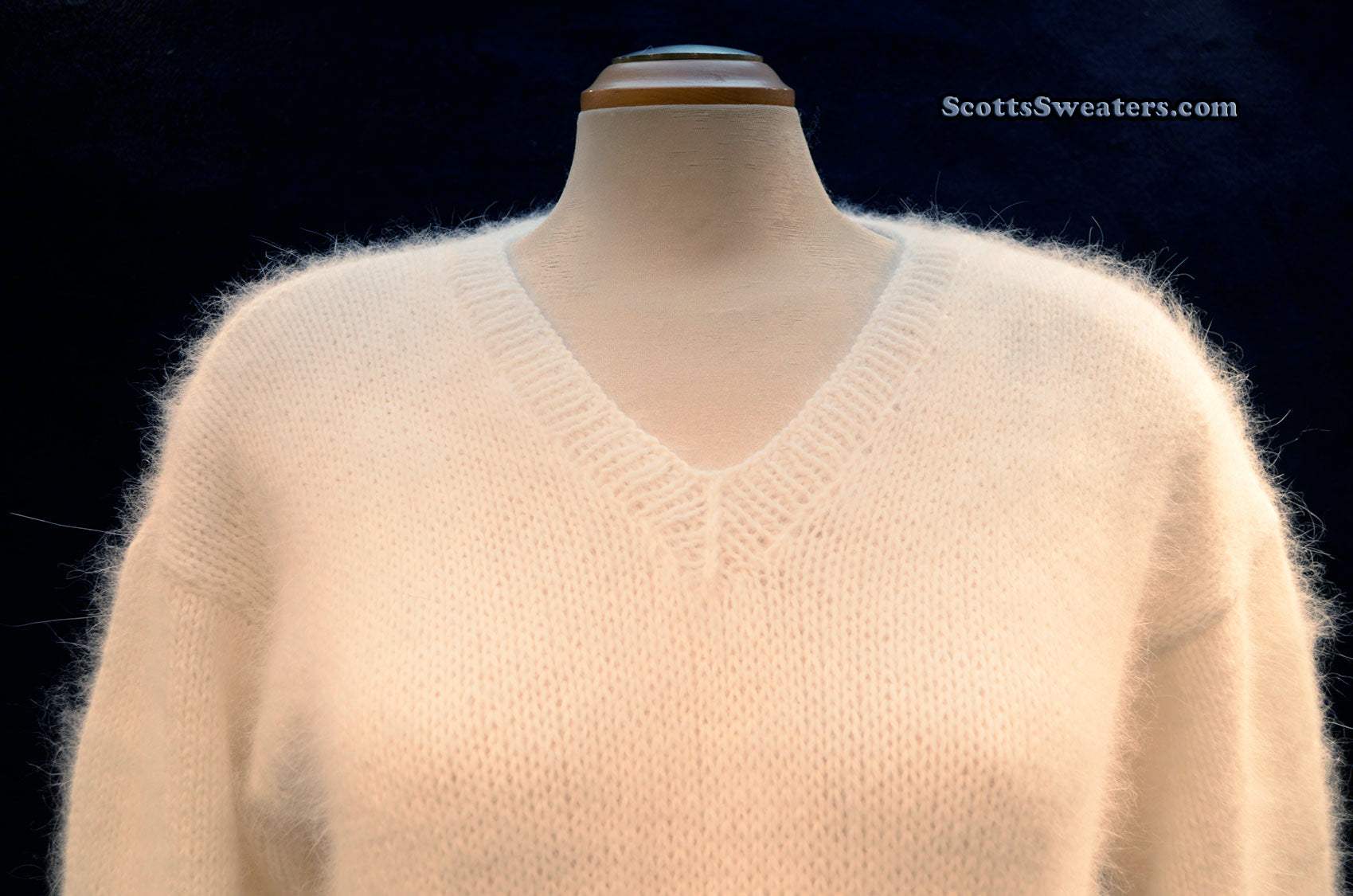 Woman's white hand-knit V-neck angora sweater by Scott's Sweaters, medium size