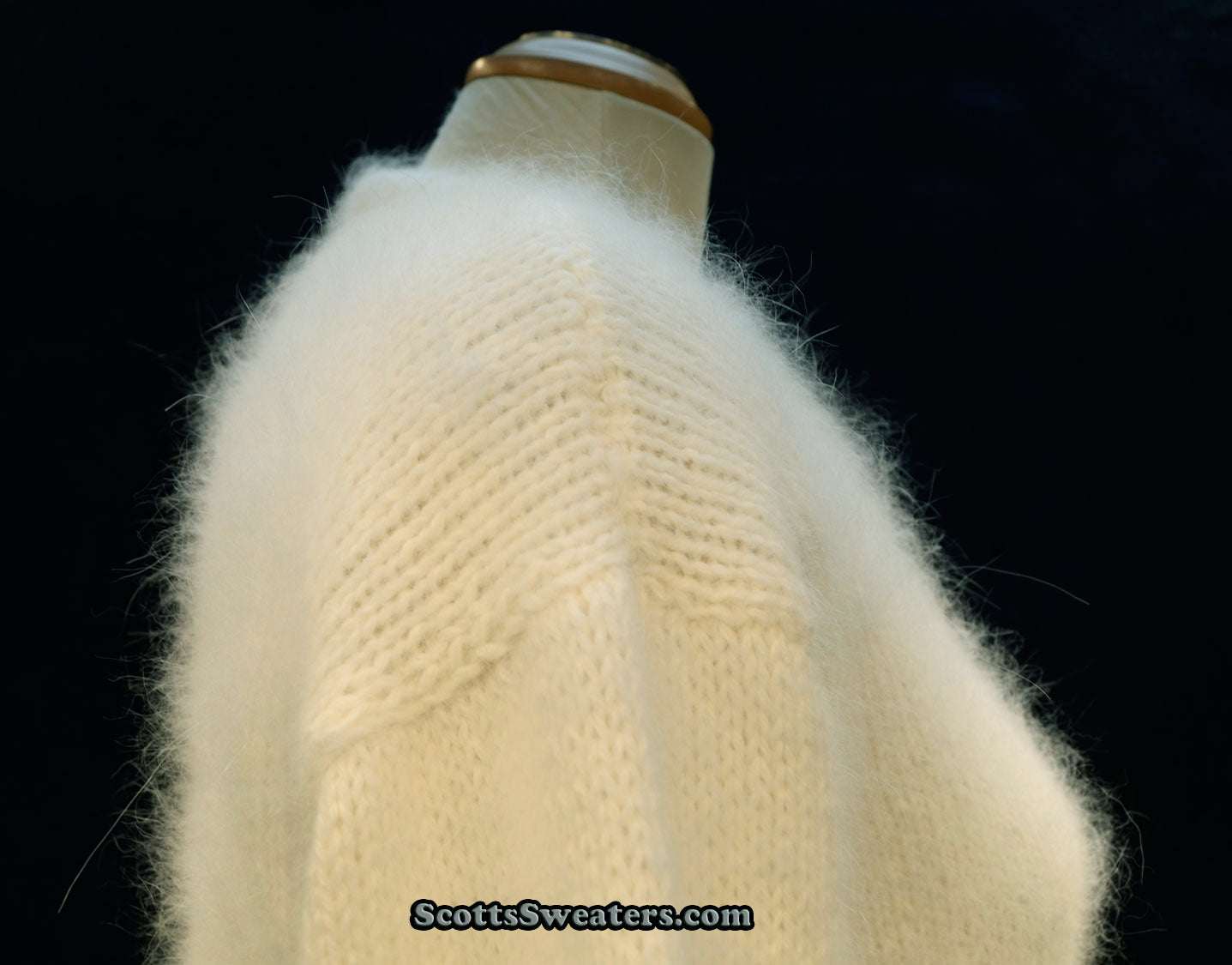 Woman's white hand-knit angora sweater with V-neck, medium size, made from home-spun angora yarn