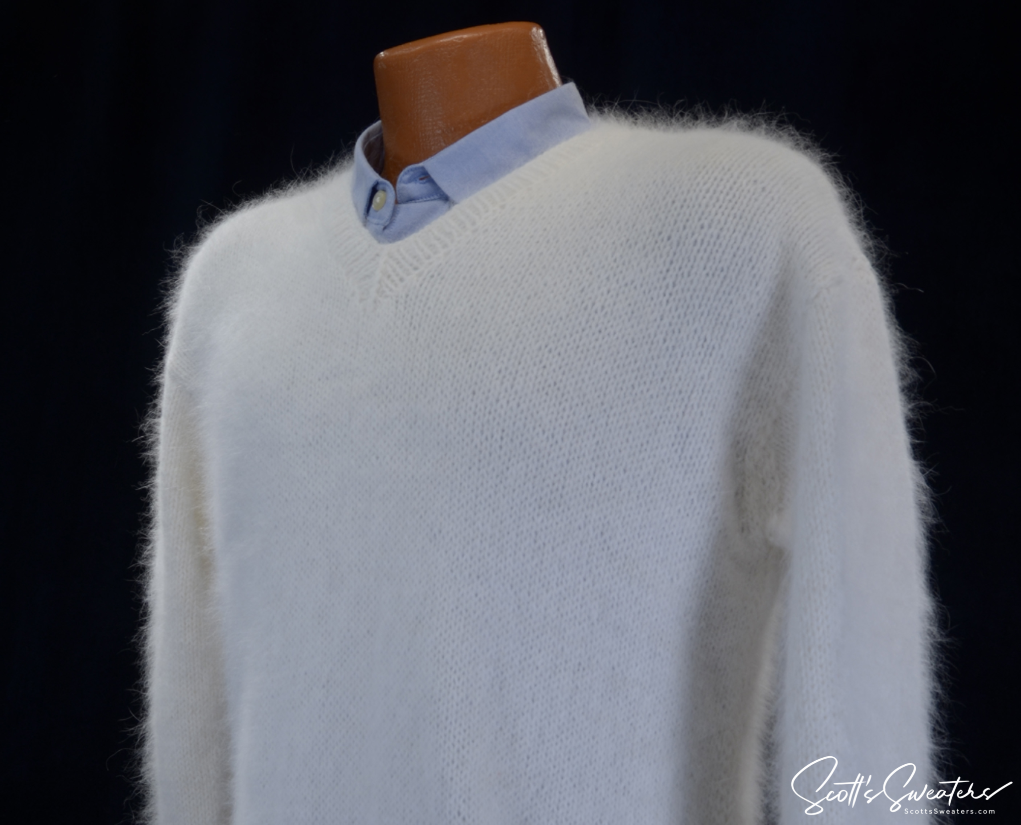 Men's handknit luxurious V-neck angora sweater made from 75% angora and 25% nylon fibers