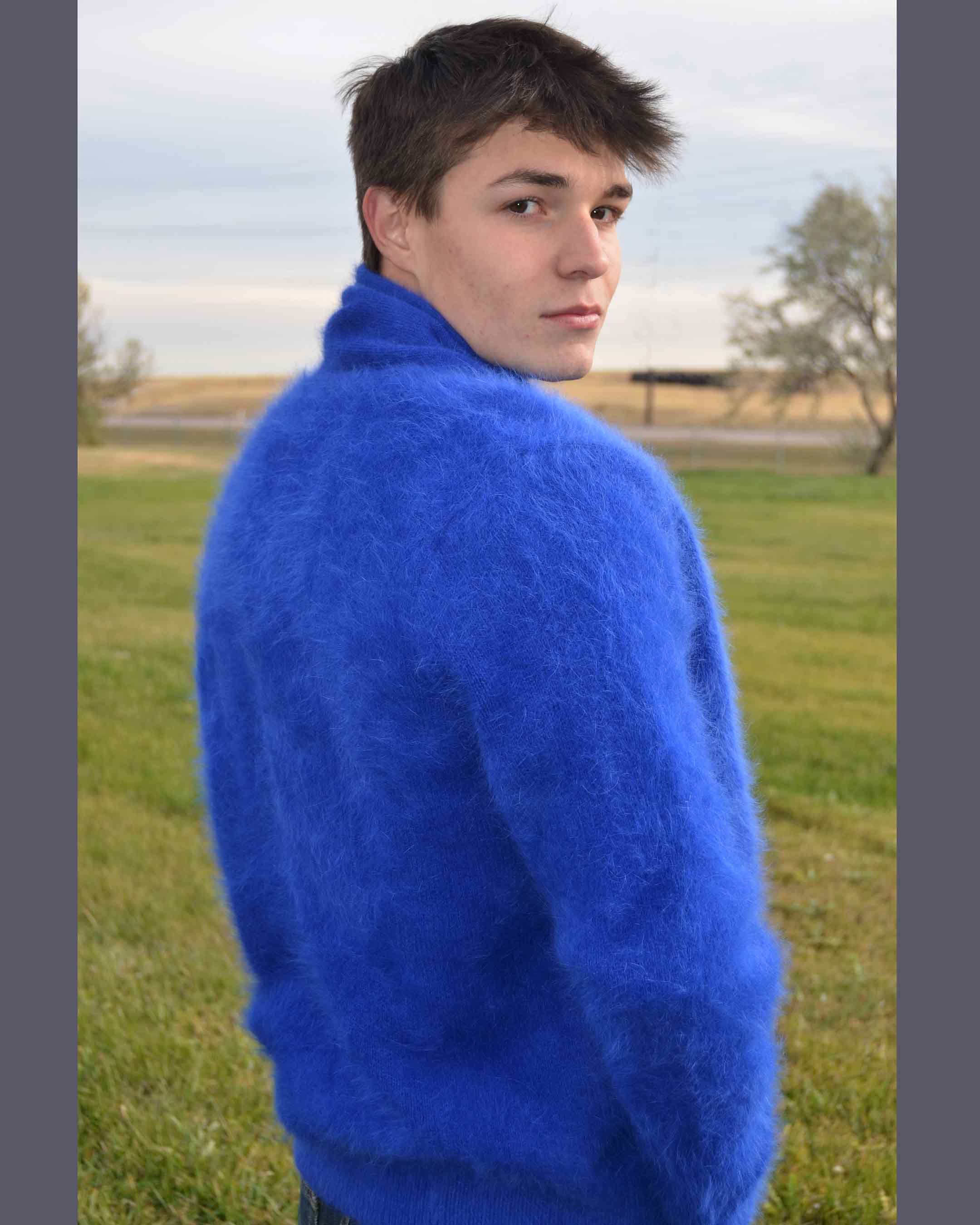 Men's solid-color angora cardigan sweater with shawlneck collar in a sleek, luxurious design