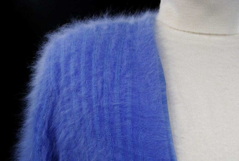Woman's powder-blue angora cardigan sweater with pockets by Connie A. Lee in small-medium and medium-large sizes