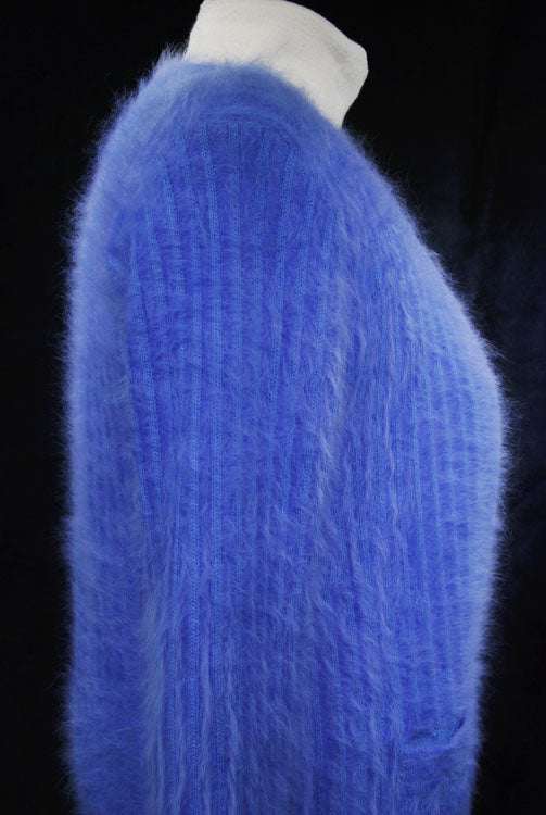 Woman's powder-blue angora cardigan sweater with pockets by Connie A. Lee